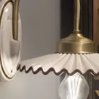 Plissierte, glänzende Keramikapplikation und handbemalte Kante – Laquila Viadurini