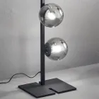 Moderne Stehlampe aus schwarzem oder goldenem Metall und mundgeblasenem Glas - Birga Viadurini