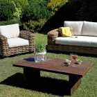 Rattan-Gartenlounge mit Couchtisch und Kissen aus Holz - Hugues Viadurini