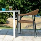 Set aus 4 Armlehnstühlen aus Aluminium und gedrehtem Rattan - Tavira Viadurini